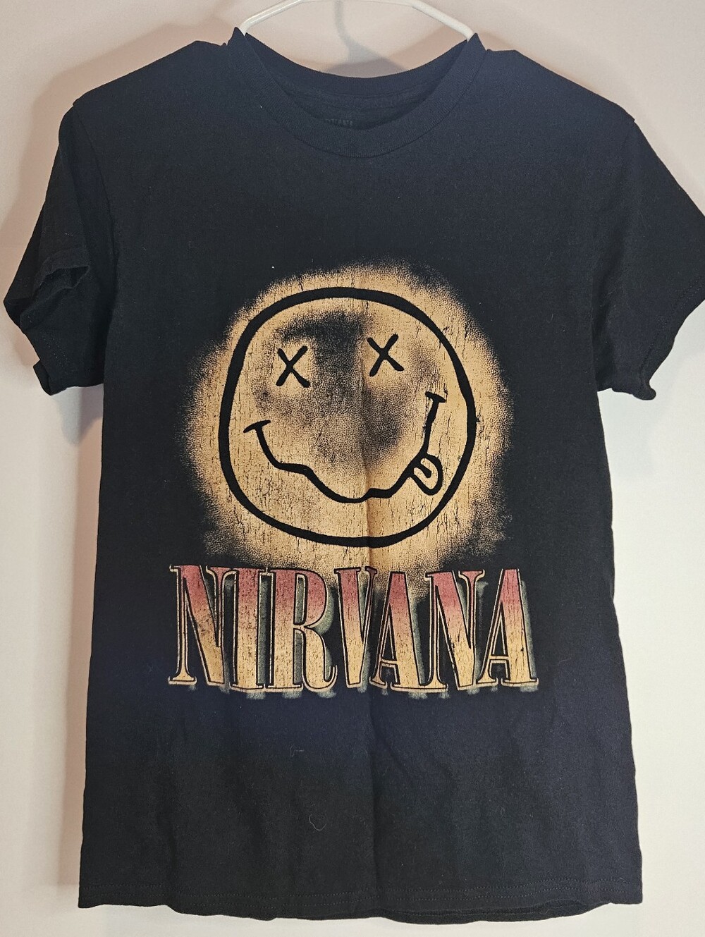 NIRVANA Black Tee with Yellow Smiley and Red-Gold Logo